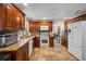 Spacious kitchen with granite countertops and wood cabinets at 22740 County Road 44A, Eustis, FL 32736