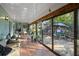 Spacious screened porch overlooking the backyard and deck at 22740 County Road 44A, Eustis, FL 32736