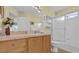 Clean bathroom with shower/tub combo and vanity at 2409 Tamarindo Dr, The Villages, FL 32162