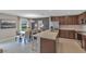 Modern kitchen with stainless steel appliances and island at 2986 Supermarine Rd, Tavares, FL 32778