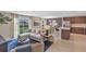 Open floorplan with living, dining and kitchen areas at 2986 Supermarine Rd, Tavares, FL 32778