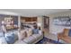 Open living space with modern furniture and kitchen views at 2986 Supermarine Rd, Tavares, FL 32778
