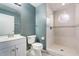 Clean bathroom with shower, toilet and white vanity at 3141 Britannia Blvd # D, Kissimmee, FL 34747