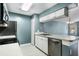 Modern kitchen with white cabinets and stainless steel appliances at 3141 Britannia Blvd # D, Kissimmee, FL 34747