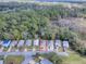 Home situated in a wooded neighborhood at 32314 Oak Park Dr, Leesburg, FL 34748