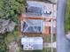 Top-down view of a house and its surrounding landscape at 32314 Oak Park Dr, Leesburg, FL 34748