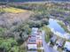 Property view showcasing home's location near water at 32314 Oak Park Dr, Leesburg, FL 34748
