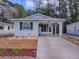 House exterior with covered carport and landscaping at 32314 Oak Park Dr, Leesburg, FL 34748