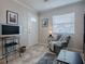 Cozy living room with comfy seating and a modern aesthetic at 32314 Oak Park Dr, Leesburg, FL 34748