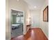 Bright entryway with hardwood floors and view of bedroom at 3810 Cosmos Way, The Villages, FL 32163