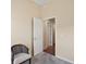 Hallway with carpeted floors and access to other rooms at 3810 Cosmos Way, The Villages, FL 32163