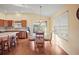 Bright kitchen with an island and breakfast nook at 3810 Cosmos Way, The Villages, FL 32163