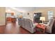 Spacious living area with hardwood floors and recessed lighting at 3810 Cosmos Way, The Villages, FL 32163