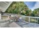 Relaxing deck with outdoor furniture and a view of the backyard at 422 W 11Th Ave, Mount Dora, FL 32757