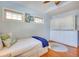 Small bedroom with white built-in drawers and a twin bed at 422 W 11Th Ave, Mount Dora, FL 32757