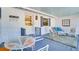 Inviting front porch with rocking chairs and outdoor seating at 422 W 11Th Ave, Mount Dora, FL 32757
