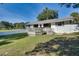 Ranch style home with a large backyard and deck at 422 W 11Th Ave, Mount Dora, FL 32757