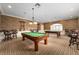 Community game room featuring two billiard tables and comfortable seating at 5304 Bowline Ct # 0, Oxford, FL 34484