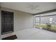 Covered screened porch with ceiling fan at 5820 Bamboo Ave, The Villages, FL 32163