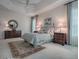 Spacious Primary bedroom with ample natural light and decorative furniture at 630 Laurel Run, The Villages, FL 32162