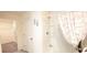 Bright bathroom with shower and linen closet at 716 Se 64Th Ter, Ocala, FL 34472