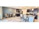 Modern kitchen with stainless steel appliances and granite countertops at 716 Se 64Th Ter, Ocala, FL 34472