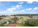 Aerial view of neighborhood with lake and surrounding area at 845 Oaks Shores Rd, Leesburg, FL 34748