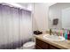 Clean bathroom with shower/tub combo and vanity at 1109 Catskill Dr, Haines City, FL 33844