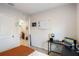 Bedroom with workspace and view of bathroom at 1109 Catskill Dr, Haines City, FL 33844