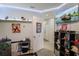 Bedroom with TV, shelving, and gaming setup at 1109 Catskill Dr, Haines City, FL 33844