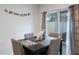 Bright dining area with sliding glass doors to backyard at 1109 Catskill Dr, Haines City, FL 33844