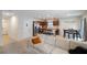 Open kitchen with island, stainless steel appliances and wood cabinets at 1109 Catskill Dr, Haines City, FL 33844