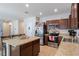 Modern kitchen with stainless steel appliances and an island at 1109 Catskill Dr, Haines City, FL 33844