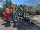 Poppy Park playground with colorful equipment at 1465 Poppy Ave, Orlando, FL 32811