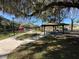 Poppy Park playground with covered picnic area at 1465 Poppy Ave, Orlando, FL 32811