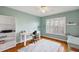 Home office with built-in shelving and a window at 17640 Se 81St Timberwood Ter, The Villages, FL 32162
