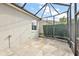 Screened patio with flagstone flooring and backyard view at 17640 Se 81St Timberwood Ter, The Villages, FL 32162