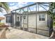 Screened patio with flagstone flooring and access to the house at 17640 Se 81St Timberwood Ter, The Villages, FL 32162