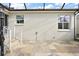 Screened patio with flagstone flooring and backyard access at 17640 Se 81St Timberwood Ter, The Villages, FL 32162