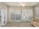 Relaxing sunroom with tiled floors and window blinds at 17640 Se 81St Timberwood Ter, The Villages, FL 32162