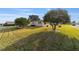 Landscaped yard with curb appeal and a house visible at 2001 Castano Pl, The Villages, FL 32159