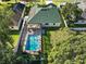 An aerial view showcasing the home's pool and backyard at 2140 Wolf Ridge Ln, Mount Dora, FL 32757