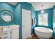 Spa-like bathroom with a freestanding tub and teal accents at 2140 Wolf Ridge Ln, Mount Dora, FL 32757