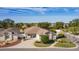 Single-story house, well-maintained landscaping, and driveway at 2243 Montbrook Pl, The Villages, FL 32162