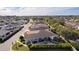 Community view showcasing numerous homes with mature landscaping at 2243 Montbrook Pl, The Villages, FL 32162