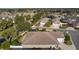 Aerial view of home showcasing backyard patio and screened enclosure at 2243 Montbrook Pl, The Villages, FL 32162