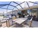 Outdoor patio with seating area, perfect for entertaining at 2243 Montbrook Pl, The Villages, FL 32162