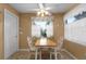 Cozy breakfast nook with table and chairs, near window at 2709 Tremont Dr, Eustis, FL 32726