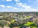 Community overview showcasing various houses and landscape at 27437 Desert Rose Ct, Leesburg, FL 34748