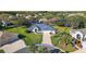 Single-Gathering home on a corner lot with a large yard at 27437 Desert Rose Ct, Leesburg, FL 34748